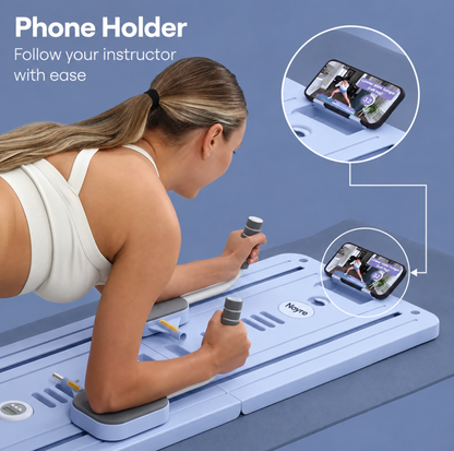 At-home Pilates reformer board with phone holder and workout timer